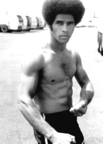 Jim Kelly was an American athlete, actor, and martial artist who rose to fame during the Blaxploitation film era of the 1970s. Kelly is perhaps best known for his role as Williams in the 1973 martial arts action film Enter the Dragon.